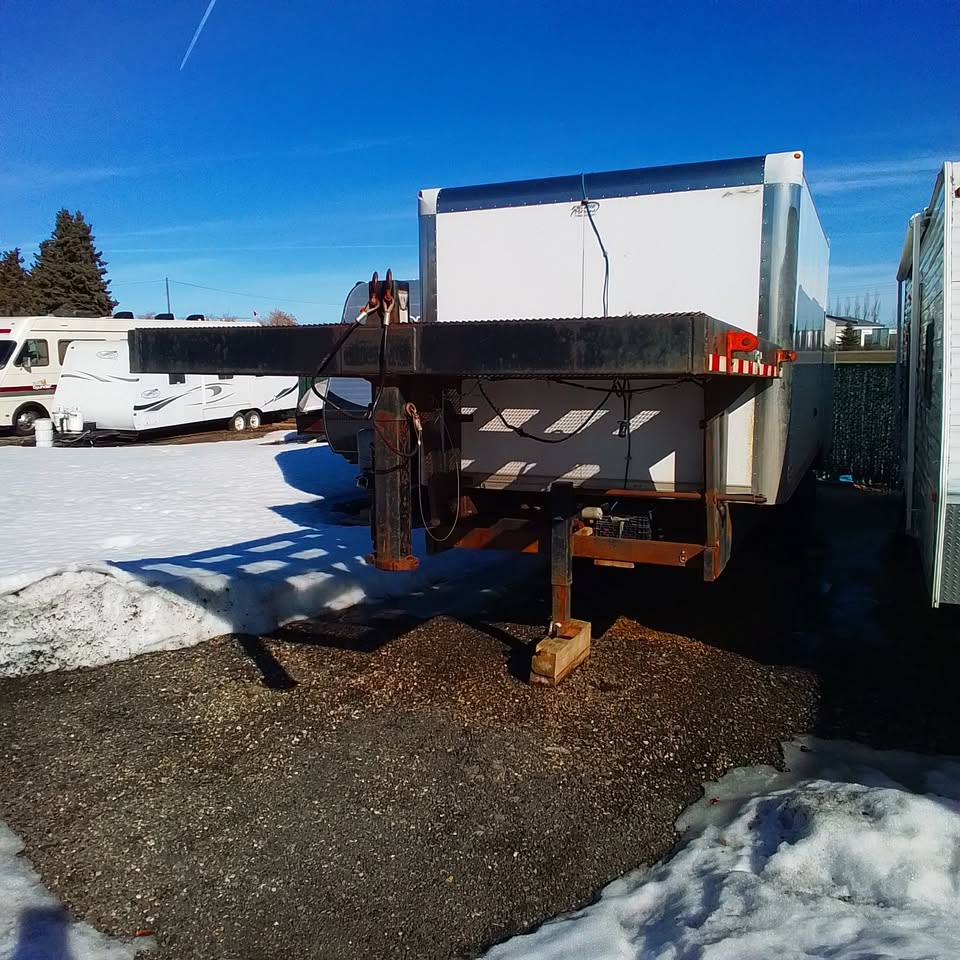 Front gooseneck view of the TOMFIXALL trailer used for local hauling, material runs and delivery support.